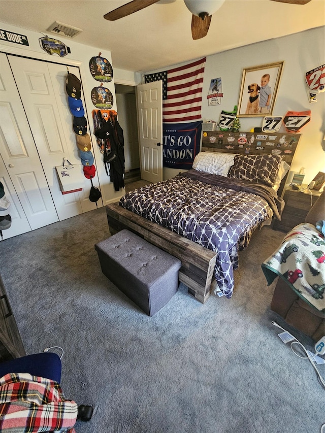 bedroom featuring ceiling fan, carpet floors, and a closet