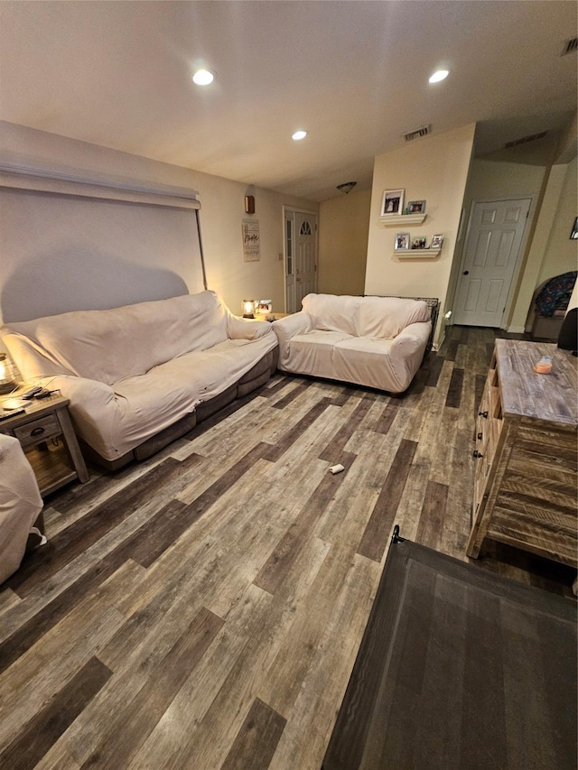 living room featuring dark hardwood / wood-style flooring