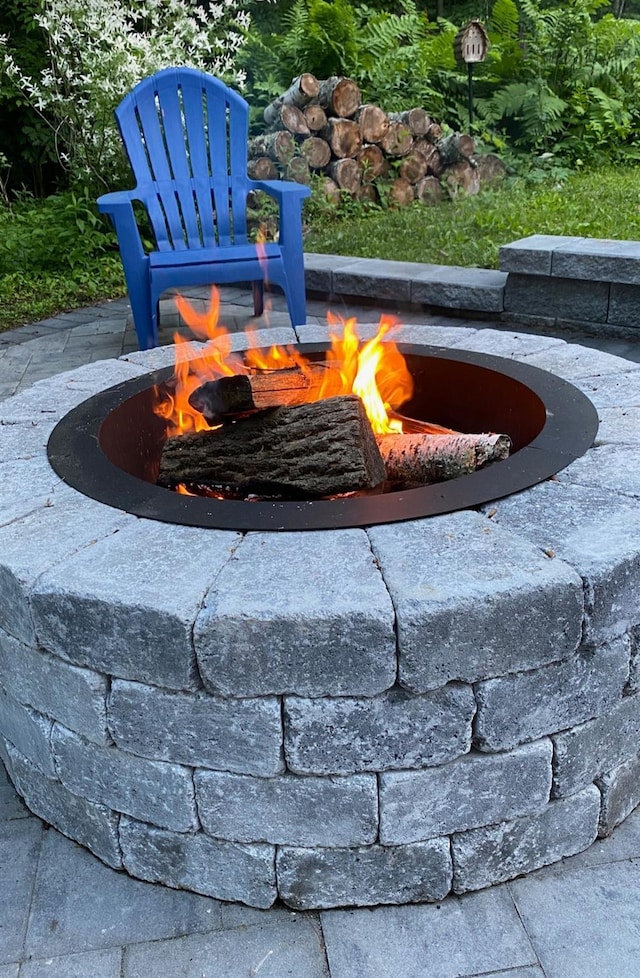 exterior details with a fire pit