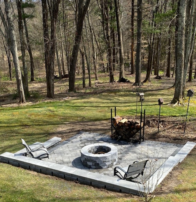 view of patio featuring a fire pit