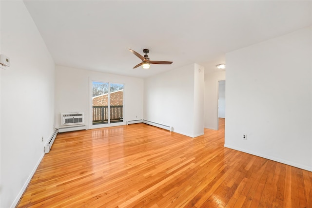 empty room featuring ceiling fan, baseboard heating, light hardwood / wood-style flooring, and a wall mounted AC