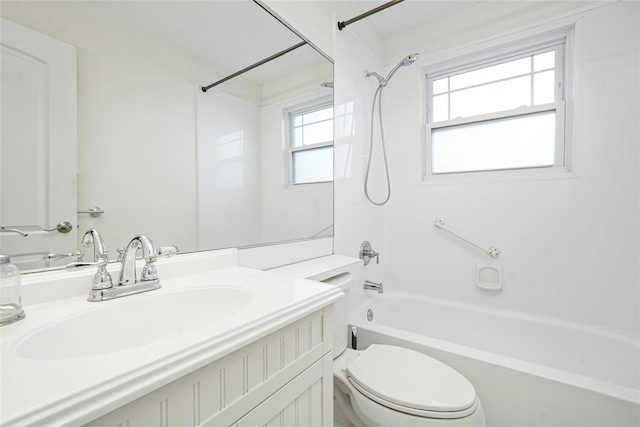 full bathroom featuring vanity, toilet, and tub / shower combination