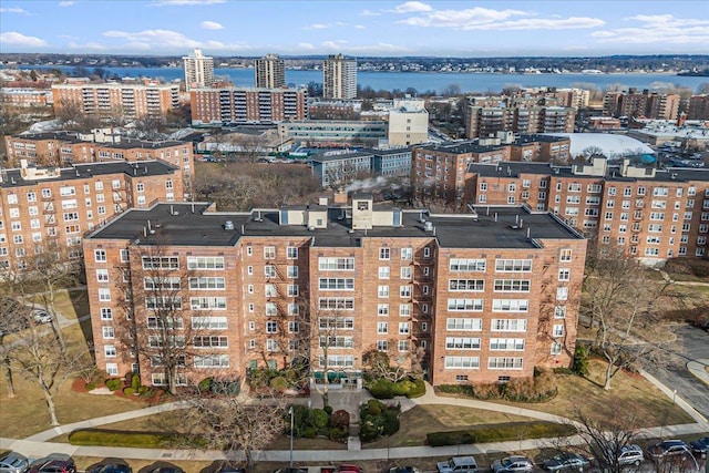 bird's eye view with a water view