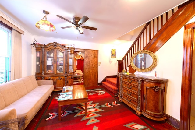 living room featuring ceiling fan