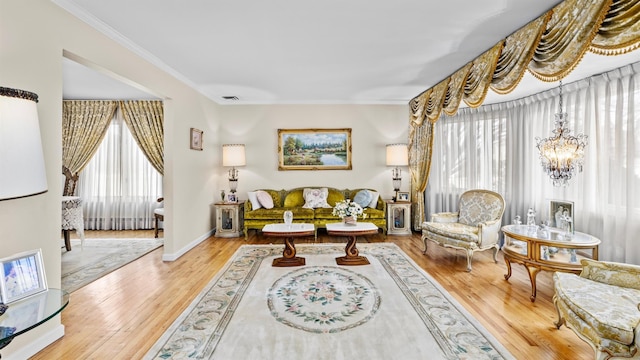 living room featuring crown molding and hardwood / wood-style floors