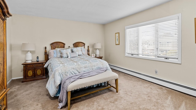 bedroom featuring baseboard heating and light carpet