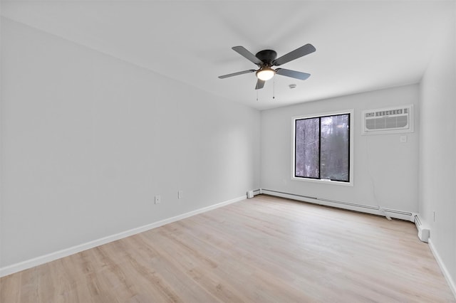 unfurnished room with ceiling fan, a baseboard heating unit, light hardwood / wood-style floors, and a wall mounted AC