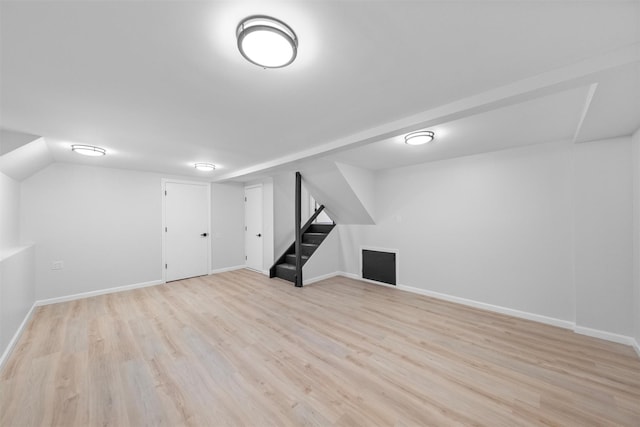 basement with light wood-type flooring