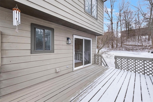 view of snow covered deck