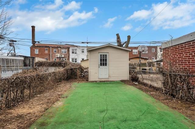 back of house with a yard