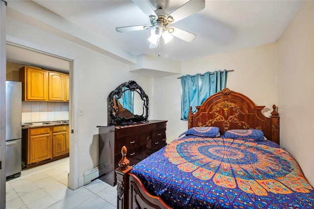 tiled bedroom with ceiling fan, a baseboard heating unit, and stainless steel fridge