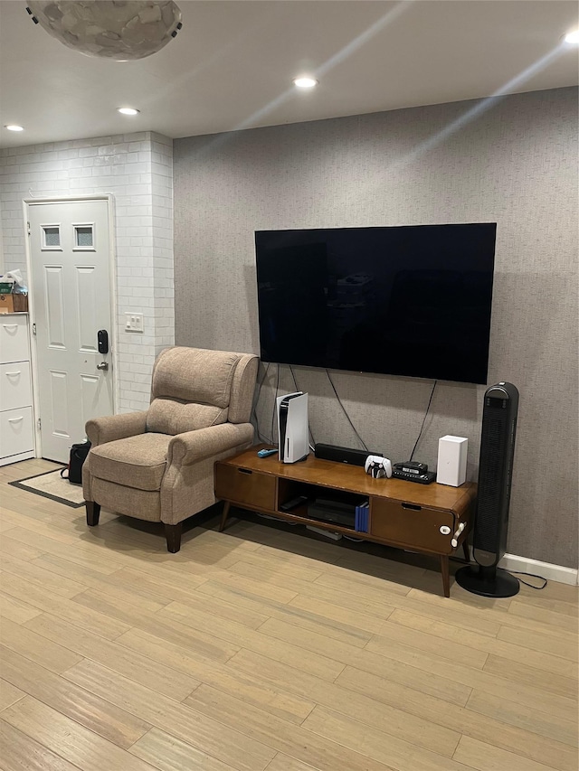 living room with light hardwood / wood-style flooring