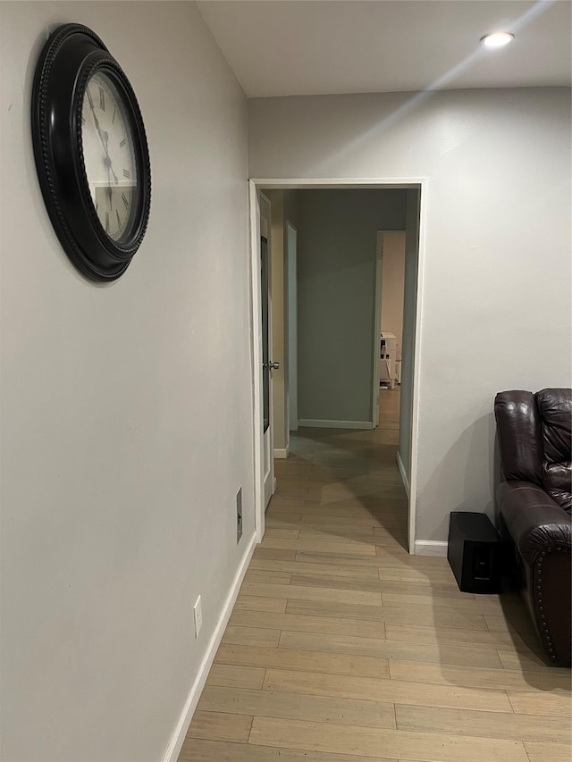 hallway featuring light hardwood / wood-style flooring