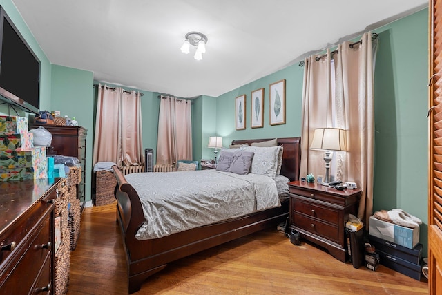 bedroom with light hardwood / wood-style flooring