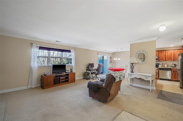 carpeted living room featuring crown molding and a notable chandelier