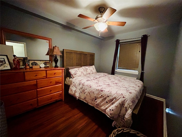 bedroom featuring dark wood-type flooring and ceiling fan