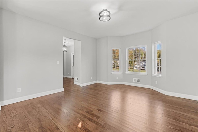 empty room featuring hardwood / wood-style floors