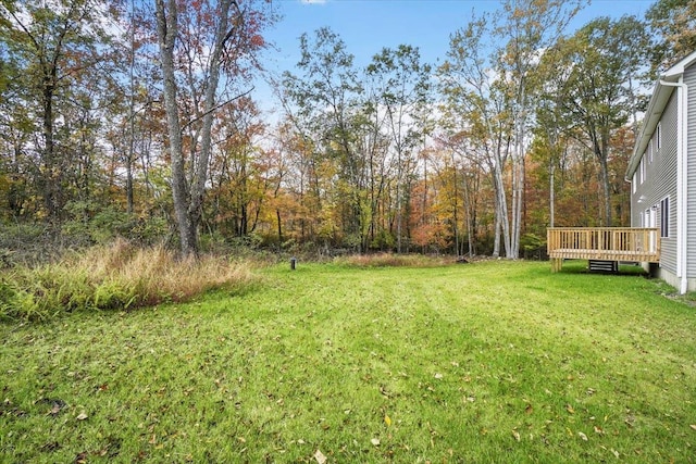 view of yard with a deck