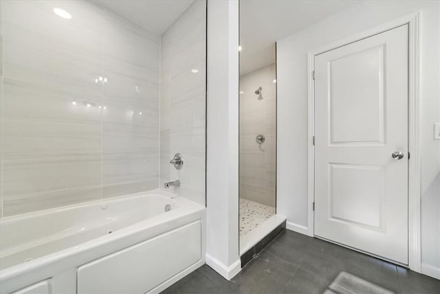 bathroom featuring separate shower and tub and tile patterned floors