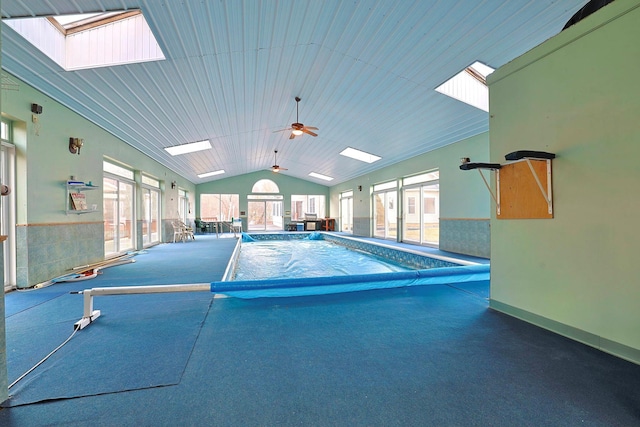 view of swimming pool featuring ceiling fan