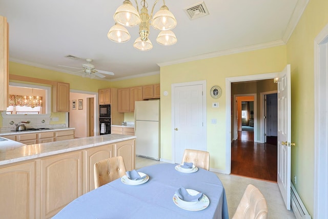 dining space with ceiling fan with notable chandelier, light wood-type flooring, ornamental molding, and a baseboard radiator