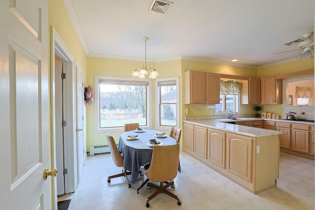 kitchen featuring light brown cabinets, ceiling fan with notable chandelier, decorative light fixtures, and crown molding