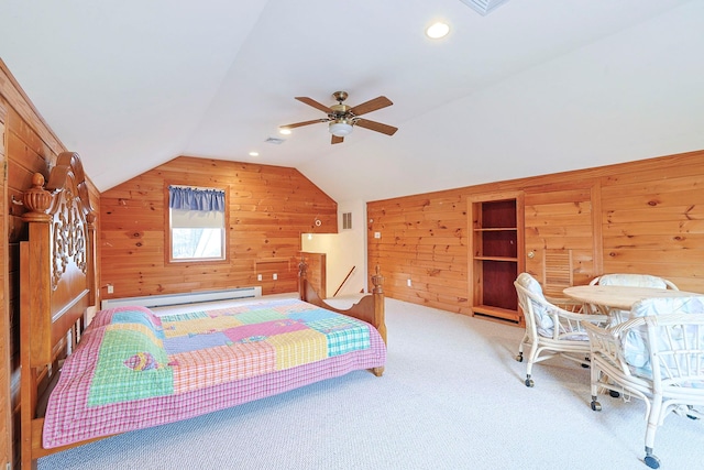 carpeted bedroom featuring lofted ceiling, baseboard heating, ceiling fan, and wooden walls