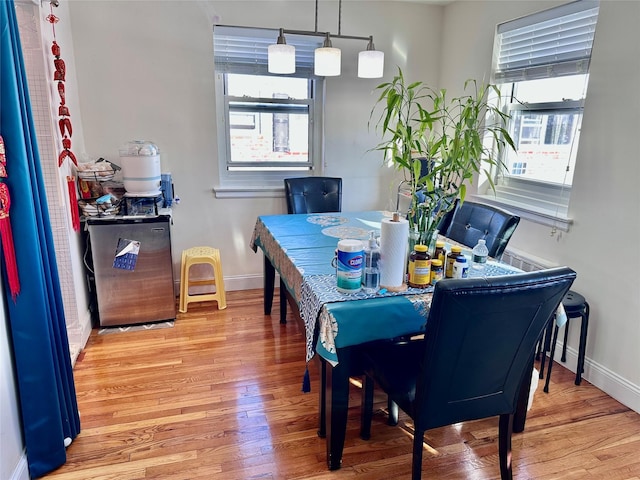 dining room featuring wood-type flooring