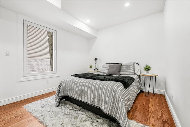 bedroom featuring hardwood / wood-style flooring