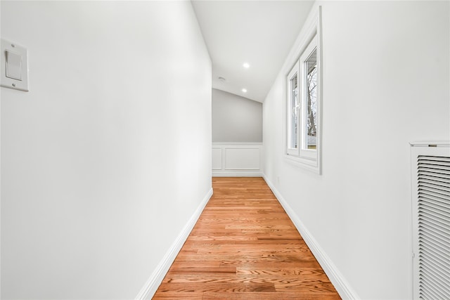 hallway with light wood-type flooring