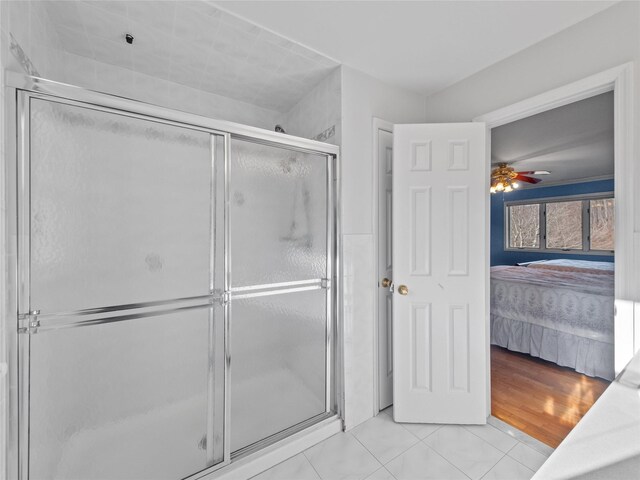11 Balanchine Ct, Airmont, NY 10952 - bathroom featuring connected bathroom, a shower stall, tile patterned flooring, and a ceiling fan