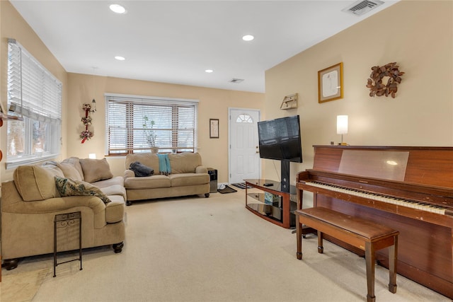 living room featuring light colored carpet