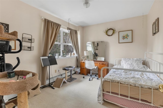 bedroom with carpet floors and a baseboard radiator