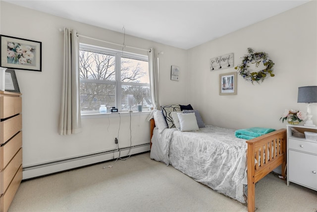 bedroom featuring a baseboard heating unit