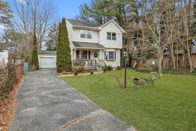 view of front facade featuring covered porch and a front lawn