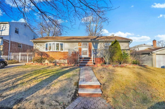 view of front of house with a front lawn