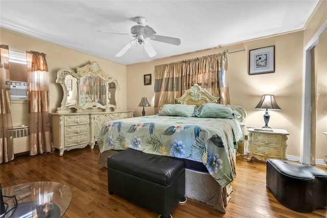 bedroom featuring hardwood / wood-style flooring and ceiling fan