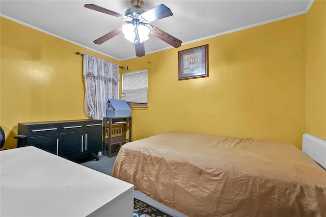 bedroom featuring carpet floors, ceiling fan, and ornamental molding