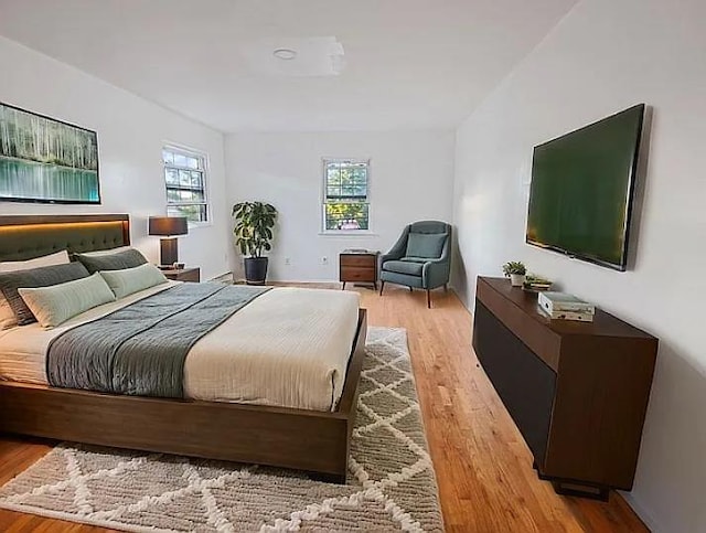 bedroom featuring light hardwood / wood-style floors