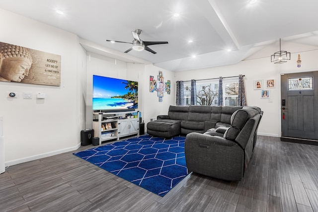 living room featuring ceiling fan and dark hardwood / wood-style flooring