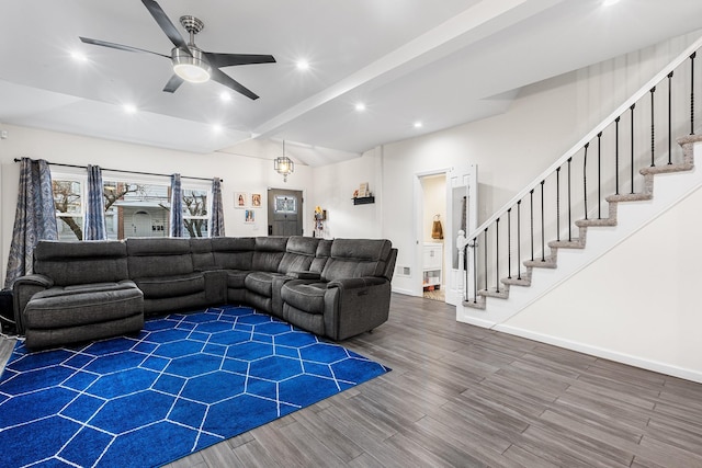 living room with ceiling fan and beam ceiling