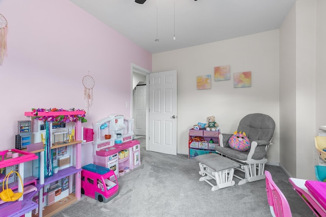 playroom featuring carpet floors and ceiling fan