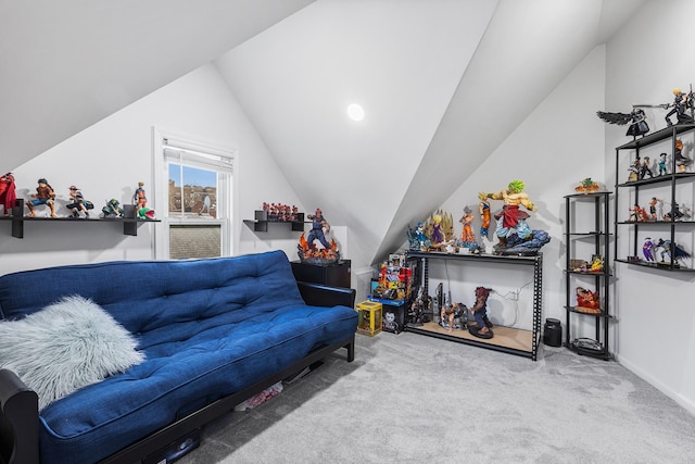 carpeted living room featuring lofted ceiling