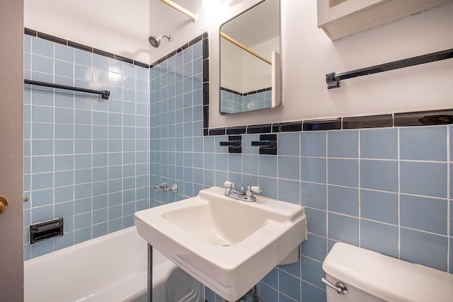 2727 Palisade Ave Unit 16Ab, Bronx, NY 10463 - full bathroom with toilet, tile walls, washtub / shower combination, and a sink