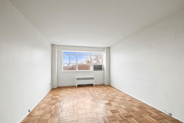 2727 Palisade Ave Unit 16Ab, Bronx, NY 10463 - spare room featuring radiator, baseboards, and cooling unit