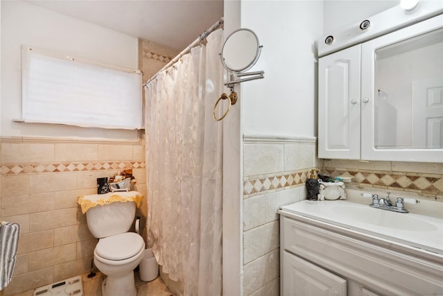 bathroom featuring a shower with curtain, vanity, tile walls, and toilet