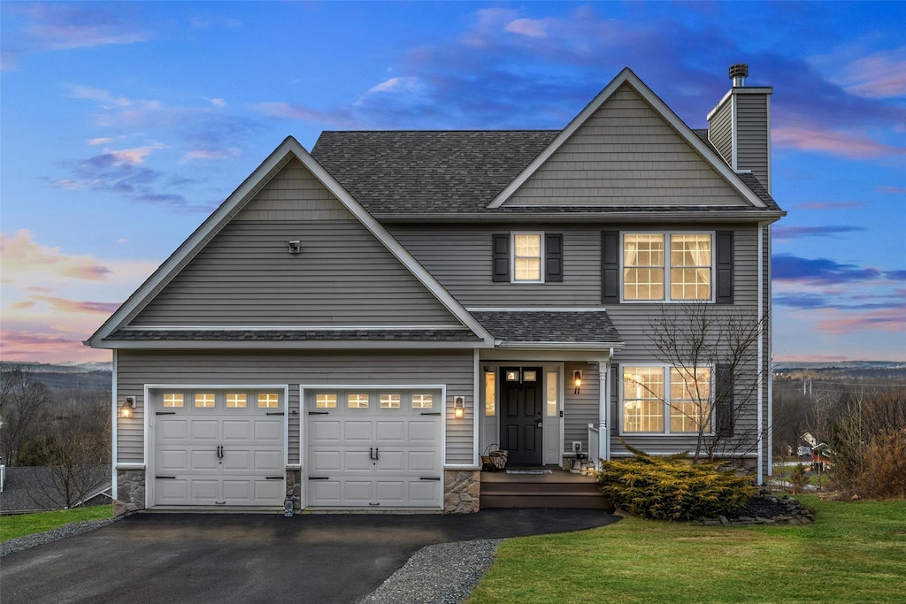 view of front of home with a yard