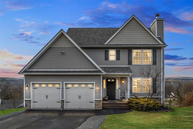 view of front of home with a yard