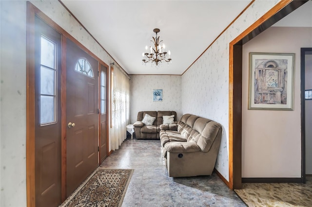 living room featuring a chandelier and crown molding