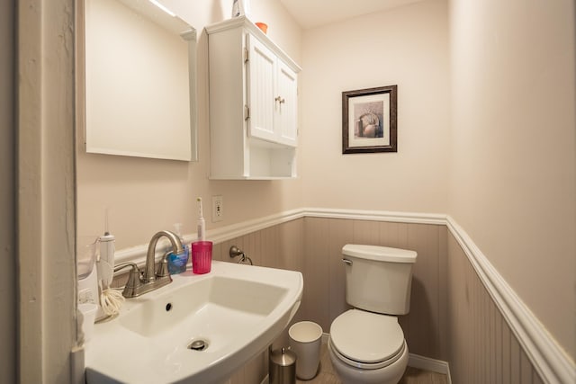 bathroom with toilet and sink